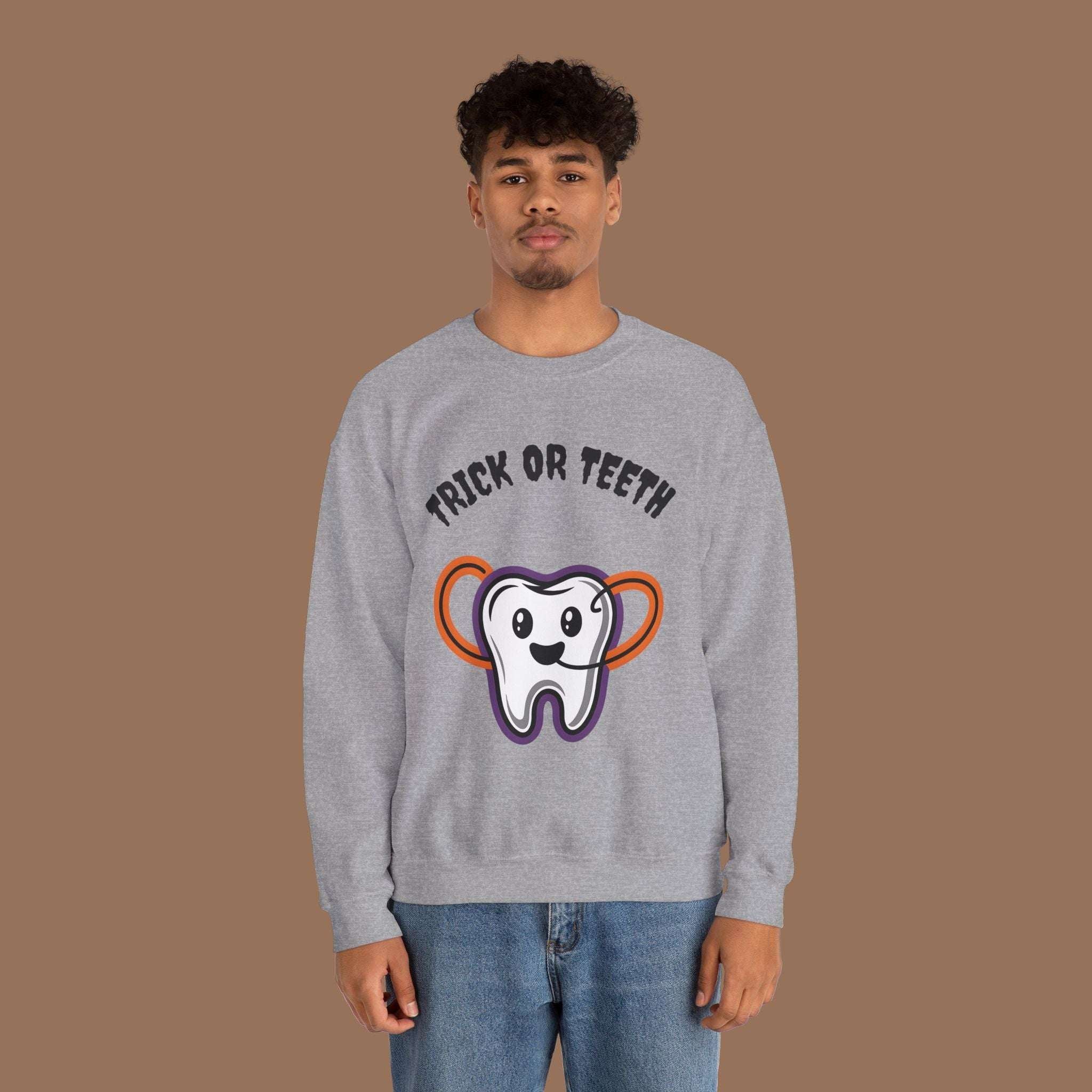Halloween Sweatshirt with Trick or Teeth Design, Funny Fall Apparel, Unisex Cozy Wear, Perfect for Halloween Parties, Gift for Dental Lovers Product vendor
